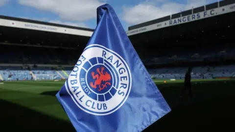 Reuters A Rangers flag on the pitch at Ibrox 