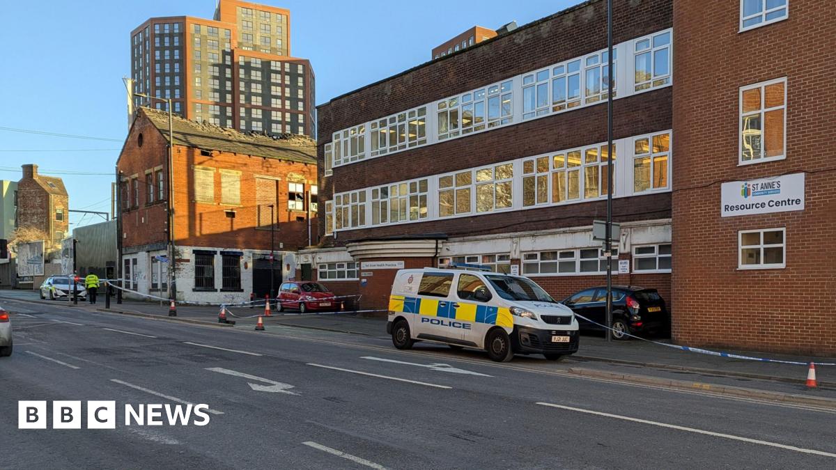 A police vehicle parked outside the St Annes Resource Centre.