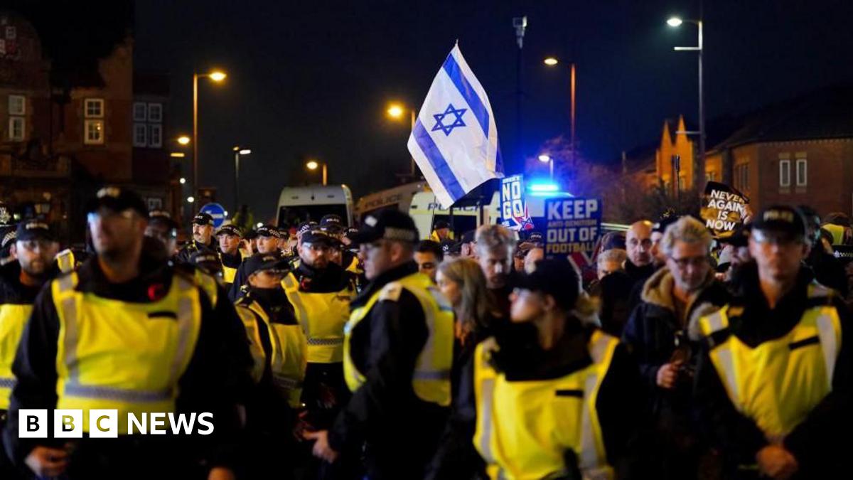 Pro Israel supporters are led away from Villa Park