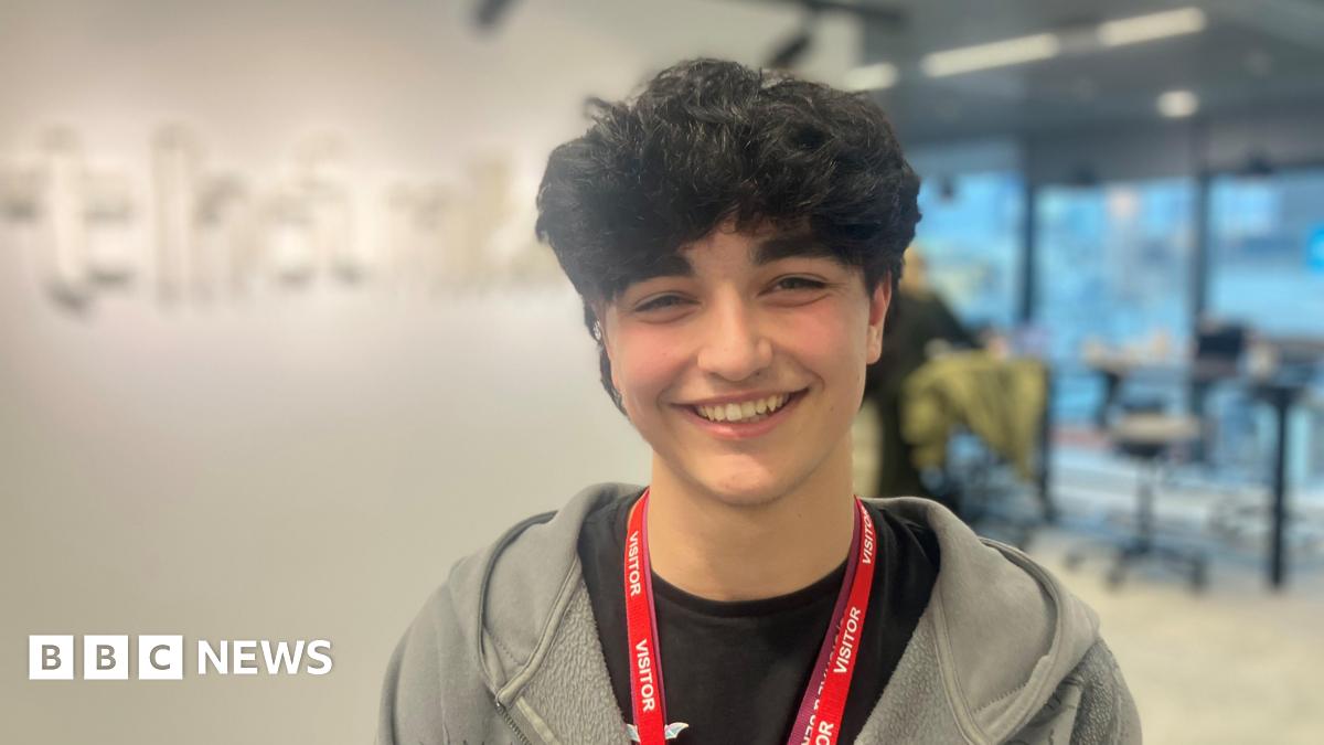 Photograph of seventeen year-old Dylan Nomovi from Middleton He is pictured in an office in Manchester city centre.