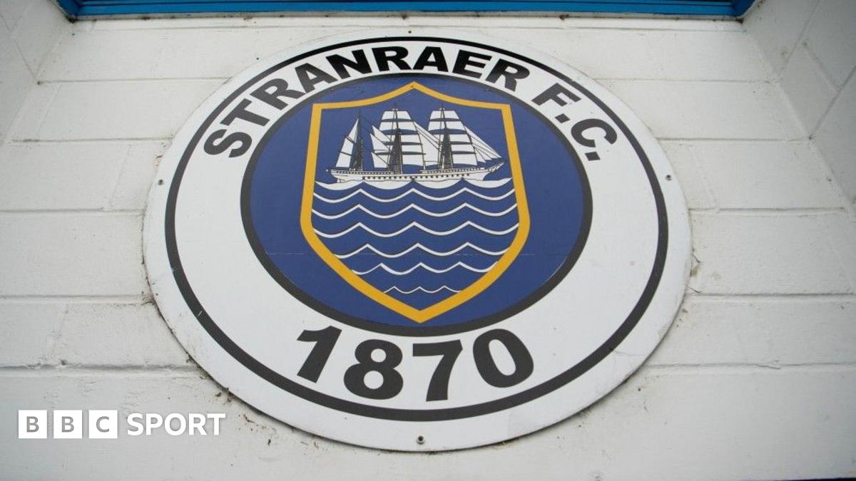 Queen's Park's Zach Mauchin celebrates as Rangers' James Tavernier misses a penalty