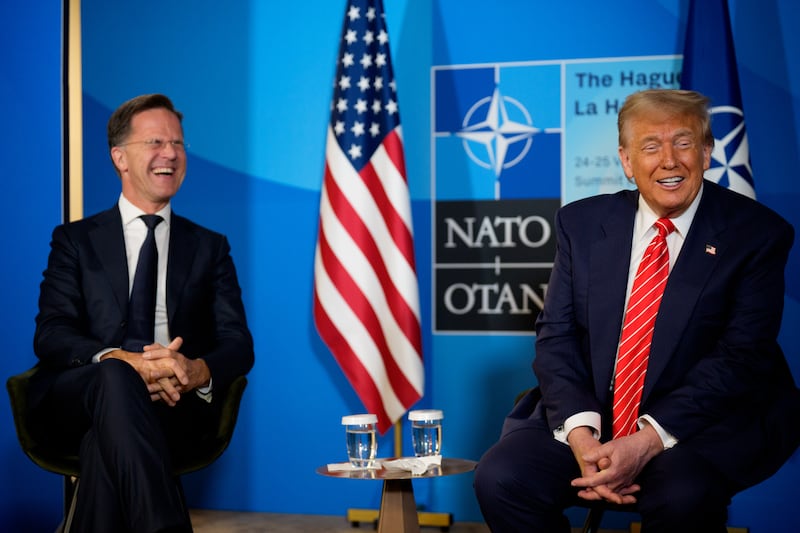 THE HAGUE, NETHERLANDS - JUNE 25: U.S. President Donald Trump (R) and NATO Secretary General Mark Rutte speak to media at the start of the second day of the 2025 NATO Summit on June 25, 2025 in The Hague, Netherlands. Among other matters, members are to approve a new defense investment plan that raises the target for defense spending to 5% of GDP. (Photo by Andrew Harnik/Getty Images)