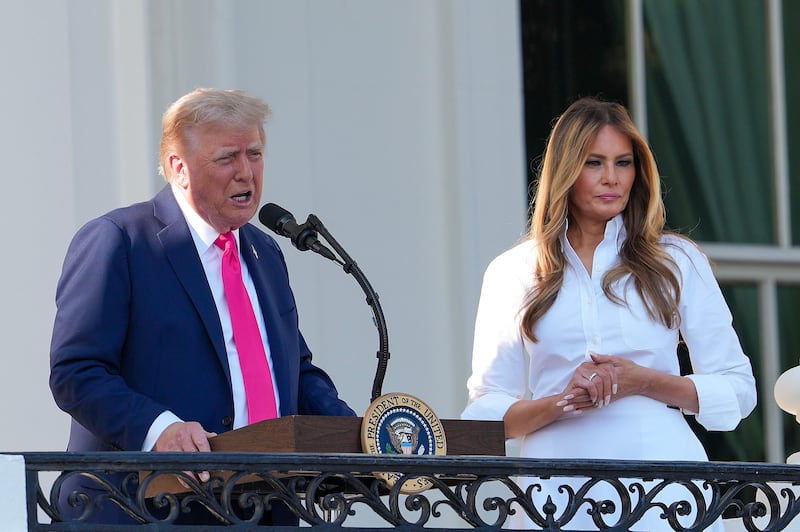 President Donald Trump, joined by first lady Melania Trump, delivers remarks during an Independence Day military family picnic on the South Lawn of the White House on July 04, 2025 in Washington, DC.