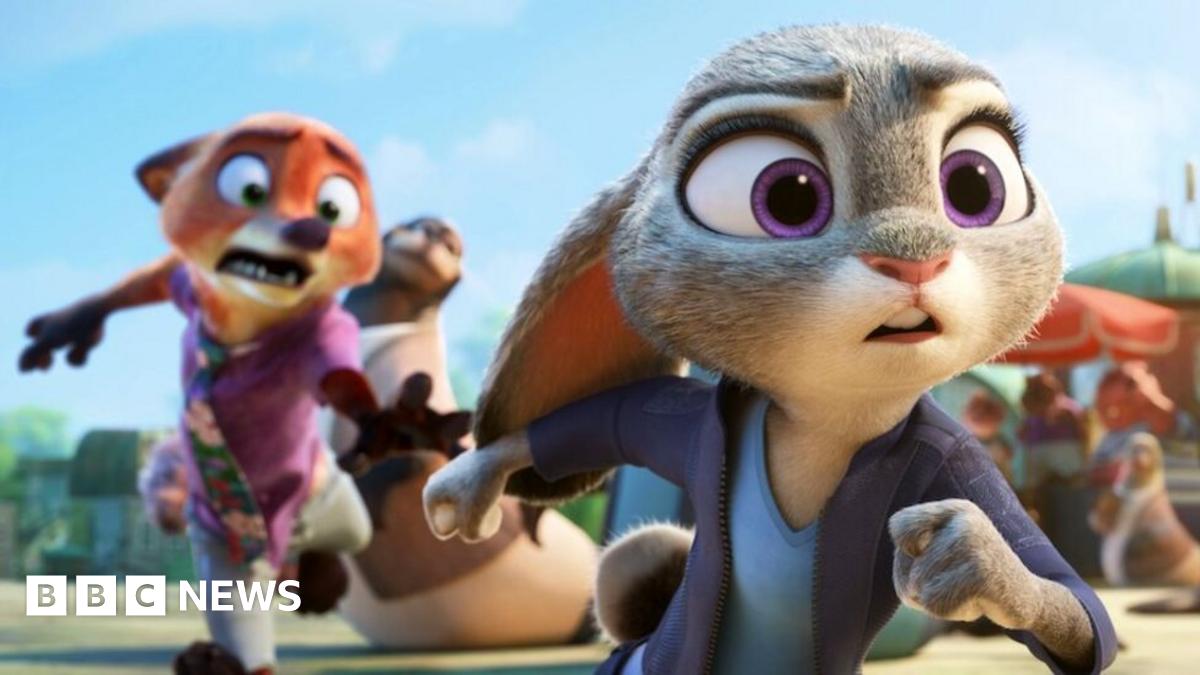 The rabbit police officer (voiced by Ginnifer Goodwin) and con artist fox (Jason Bateman) seen running in a still from the film Zootopia 2, also known as Zootropolis 2