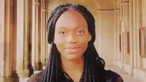 University of St Andrews a previous picture of Stella Maris in the St Andrews University courtyard. She has long, black, braided hair