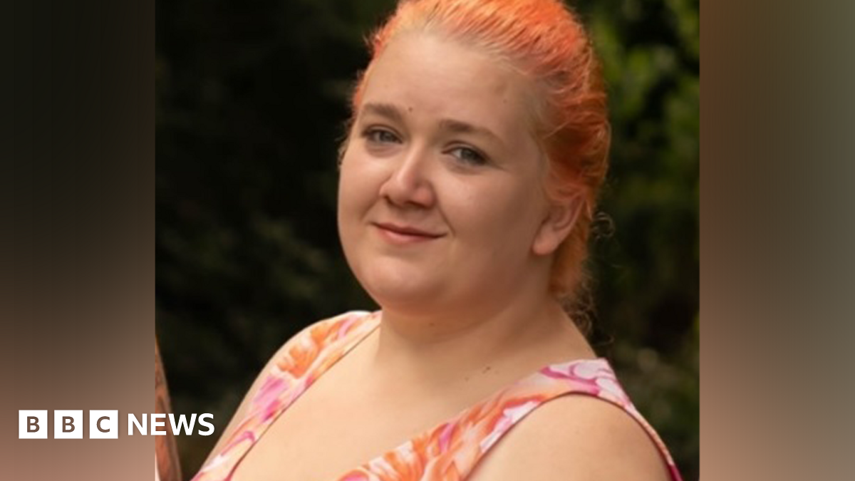 A close-up photo of Rhiannon Whyte, showing her with orange/red hair
