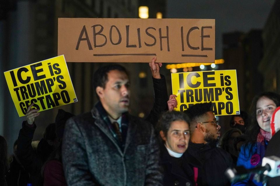 People participate in a protest in response to the fatal shooting of Renee Nicole Good by a Federal immigration officer this morning in Minneapolis, Wednesday, Jan. 7, 2026, in New York. (AP Photo/Ryan Murphy)