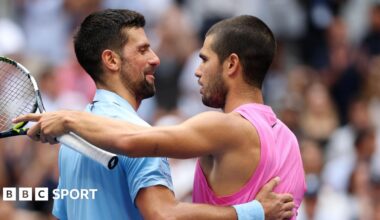 Novak Djokovic and Carlos Alcaraz embrace after their 2025 US Open quarter-final