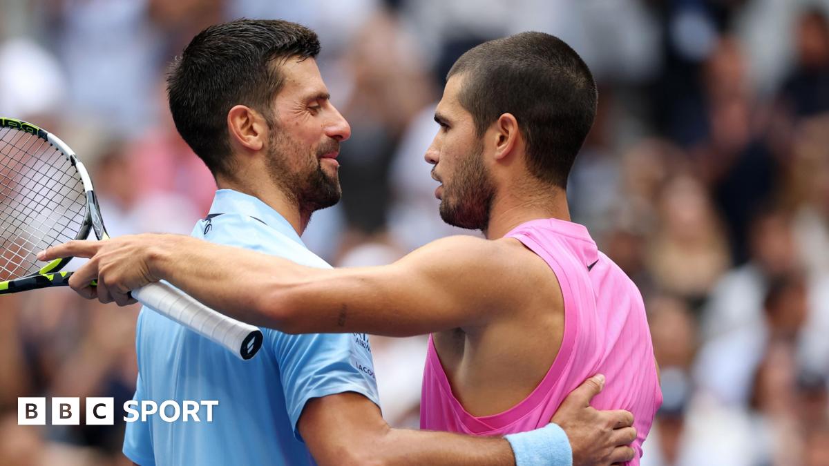 Novak Djokovic and Carlos Alcaraz embrace after their 2025 US Open quarter-final