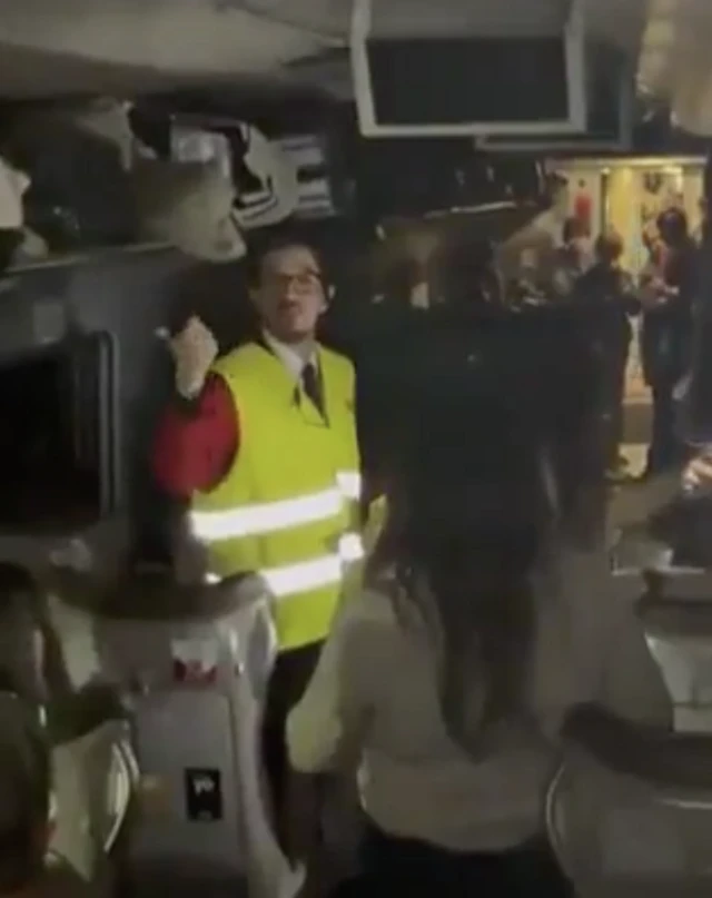 A photo of a staff member in a high-vis jacket inside one of the trains involved in yesterday’s crash