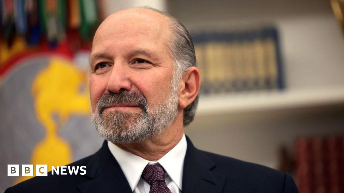 close-up of Howard Lutnick, wearing a suit and tie, and slightly smiling