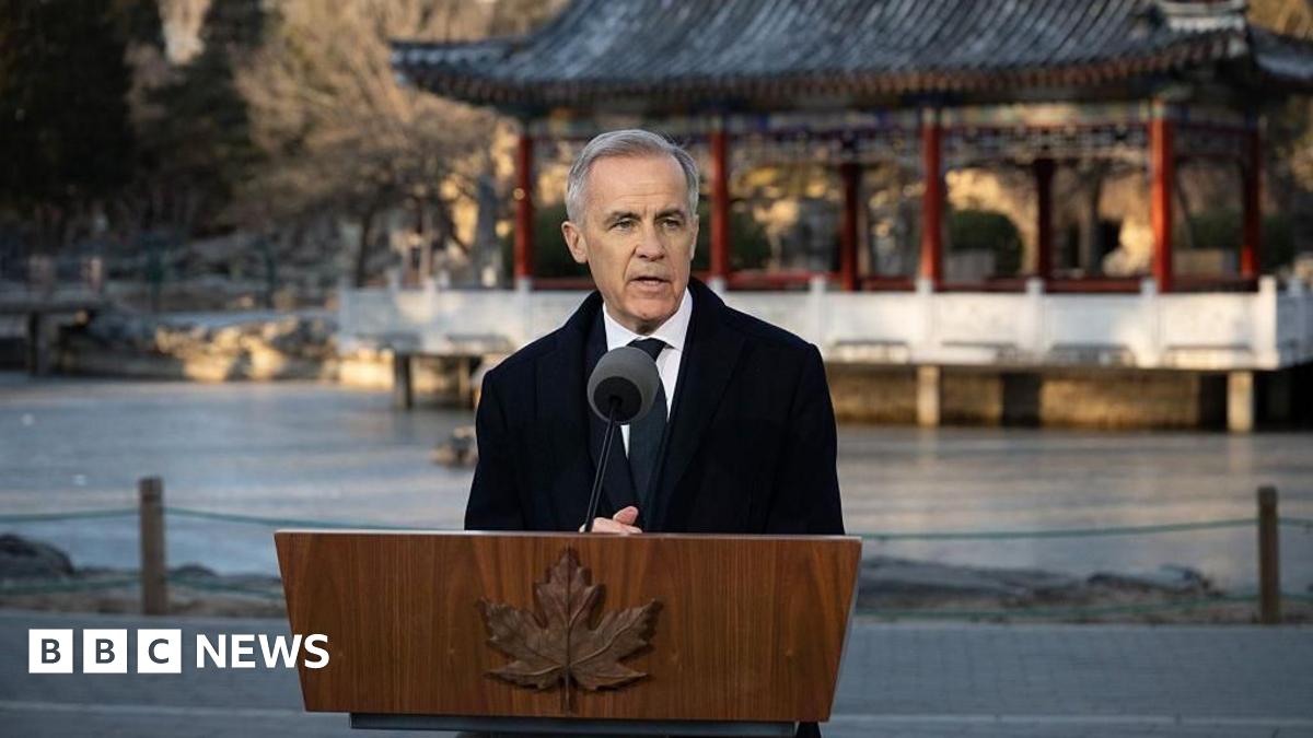 Aerial view showing hundreds of new energy vehicles waiting to be loaded onto a ro-ro ship for export at Taicang Port on January 15, 2025 in Taicang, Suzhou City, Jiangsu Province of China.