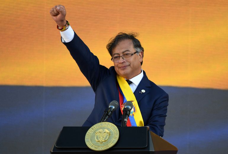 Colombia's new President Gustavo Petro gestures after delivering a speech during his inauguration ceremony at Bolivar Square in Bogota, on August 7, 2022