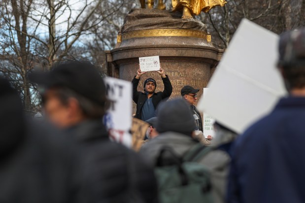People gather in Central Park for a protest against ICE