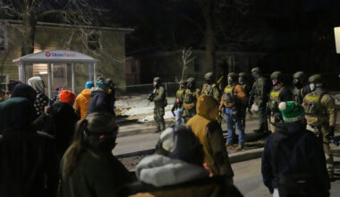 shooting scene protesters confront agents