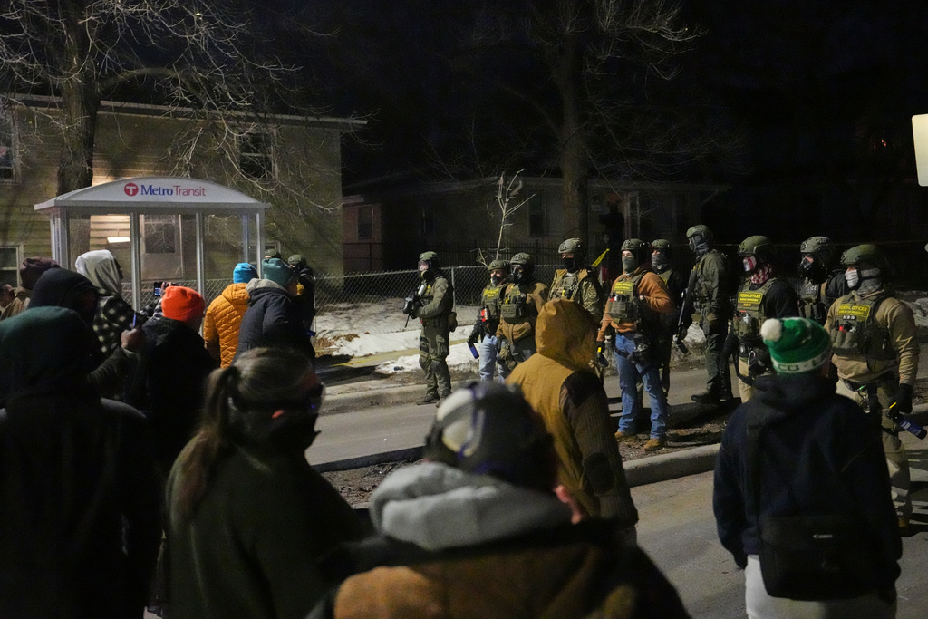 shooting scene protesters confront agents