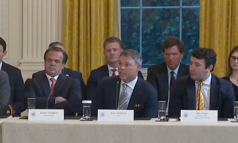 Addison, center, speaks during an oil executive get-together at the White House.