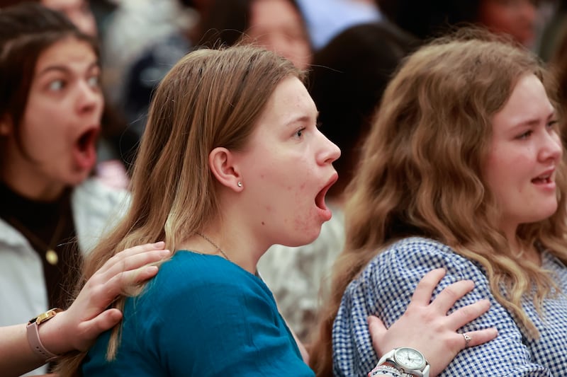 Sister missionaries react to news that they will be reassigned from the Utah Salt Lake City Temple Square Mission to another nearby mission in Utah during a missionary devotional at the Joseph Smith Memorial Building in Salt Lake City on Friday, Jan. 9, 2026.