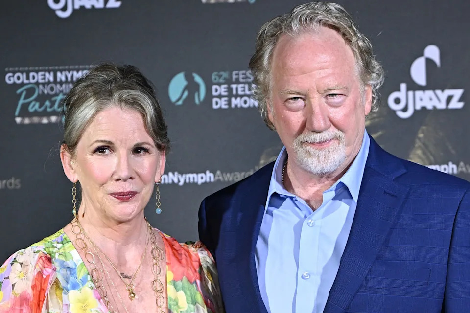 Melissa Gilbert and Timothy Busfield pose for photos at an event.