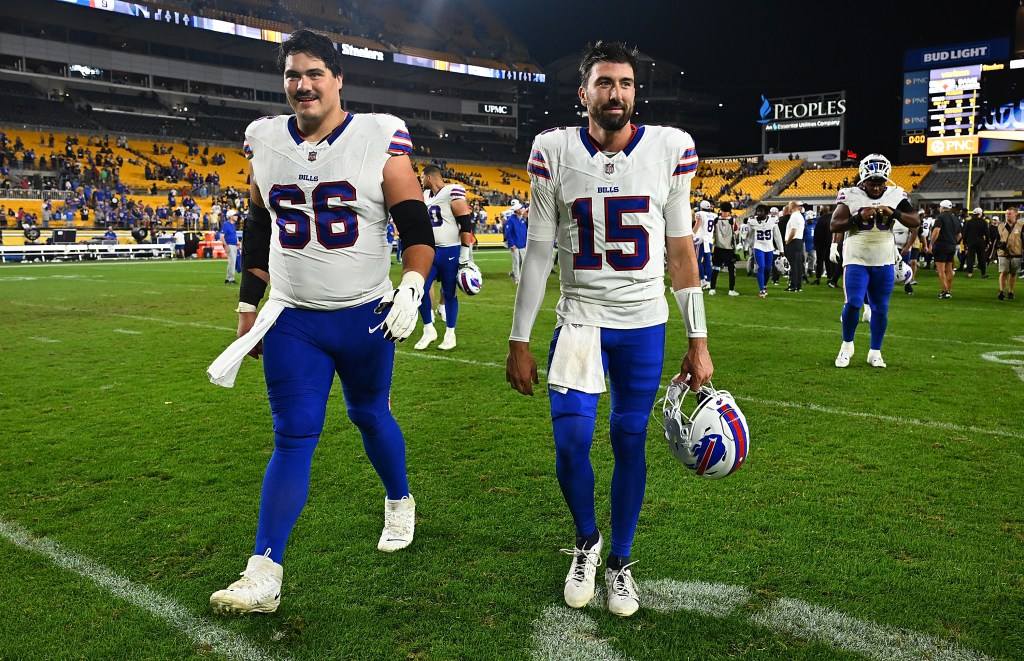 Ben DiNucci #15 of the Buffalo Bills walks off the field with Connor McGovern #66 following the Bills 9-3 win over the Steelers during the preseason game at Acrisure Stadium on August 17, 2024 in Pittsburgh, Pennsylvania. 