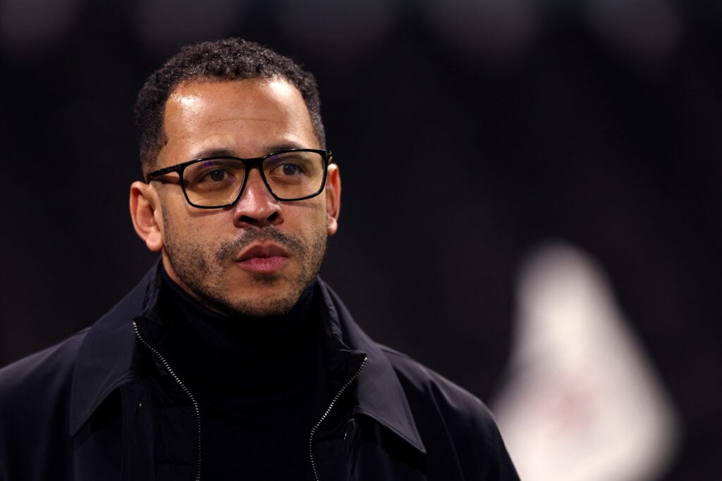 Chelsea's English head coach Liam Rosenior walks on the pitch ahead of the English Premier League football match between Fulham and Chelsea