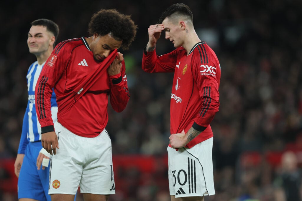 Joshua Zirkzee and Benjamin Sesko look dejected during the FA Cup third-round match between Manchester United and Brighton and Hove Albion in 2026 in Manchester, England.