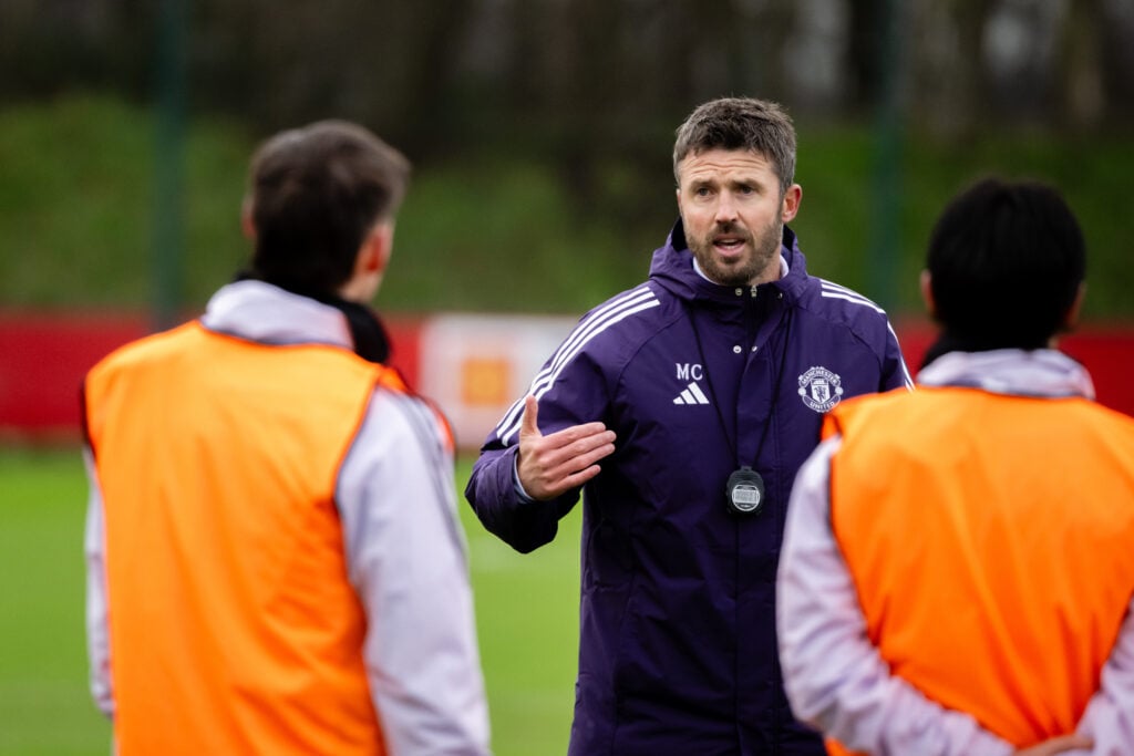 Michael Carrick gives instructions during Manchester United Training Session