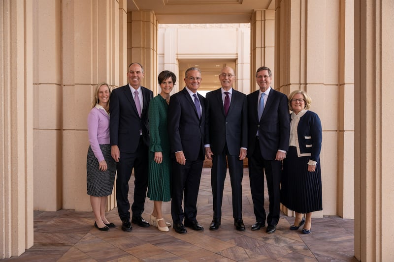 President Henry B. Eyring and Elder Patrick Kearon stand with other Church leaders outside the Red Cliffs Utah Temple a day before its dedication.