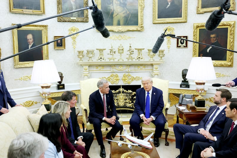 WASHINGTON, DC - OCTOBER 07: U.S. President Donald Trump (R) and Canadian Prime Minister Mark Carney speak to reporters in the Oval Office of the White House on October 07, 2025 in Washington, DC. Carney and Trump will meet in the Oval Office and later have a bilateral lunch where they are expected to discuss a range of topics including U.S. tariffs. Carney visited the White House earlier in the year after he was elected prime minister.  (Photo by Anna Moneymaker/Getty Images)