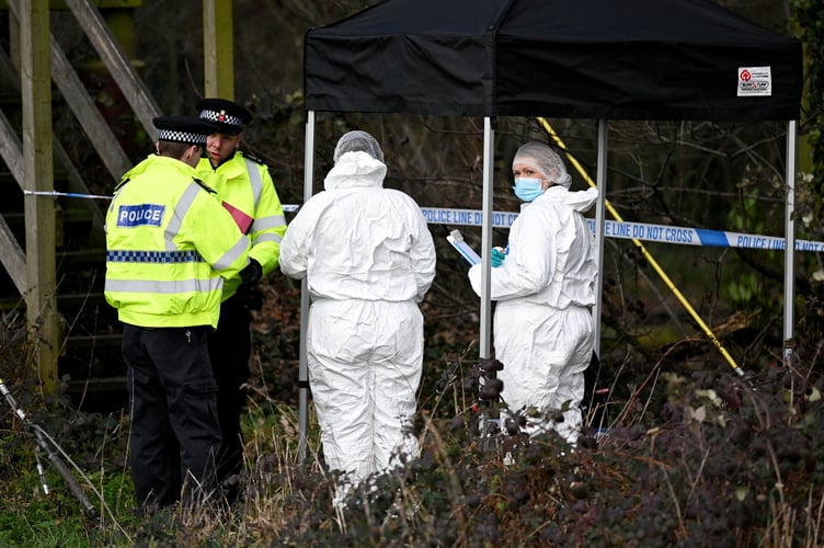 Police forensics at the scene of a murder investigation that has been launched following the death of a teenage boy in Guildford, Surrey, 20th January 2026 //  A murder probe has been launched following the death of a teenage boy in Guildford.  Emergency services were called to reports of a stabbing in woodland off Lido Road in Stoke Park - near to Guildford College - at around 6:10pm last night (Mon).  Despite their best efforts a teenage boy died at the scene, Surrey Police said.  An investigation is now underway. No arrests have been made. 
