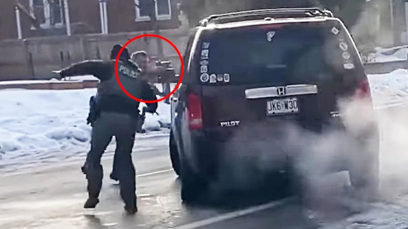 A screen grab of ICE agent Jonathan Ross, circled in red, fatally shooting Renee Nicole Good in Minneapolis, Minnesota.