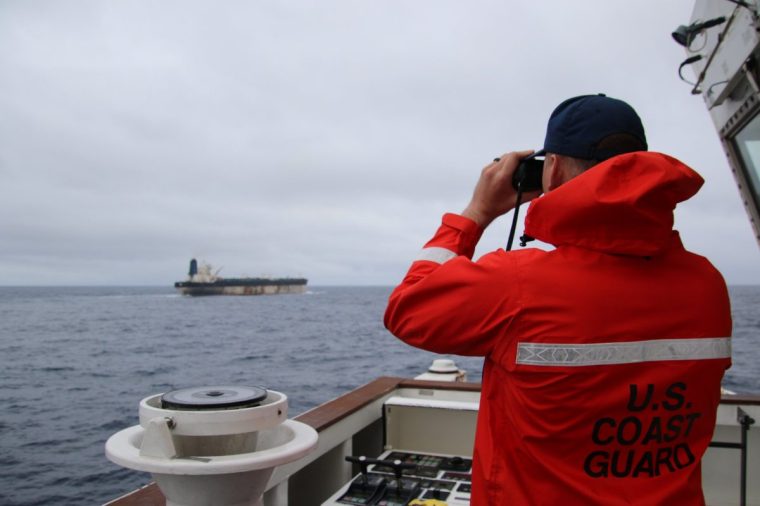 Handout photo taken from the X account of US European Command @US_EUCOM showing a member of the US Coast Guard observing a Venezuela-linked oil tanker which is travelling off British waters. US forces are reportedly attempting to seize the Marinera, a Russian-flagged vessel previously known as Bella-1, which is said to have escaped Donald Trump's "total naval blockade" of Venezuela. Issue date: Wednesday January 7, 2026. PA Photo. Photo credit should read: @US_EUCOM/X/PA Wire NOTE TO EDITORS: This handout photo may only be used for editorial reporting purposes for the contemporaneous illustration of events, things or the people in the image or facts mentioned in the caption. Reuse of the picture may require further permission from the copyright holder.