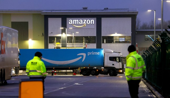 An Amazon lorry manoeuvres as workers strike at the Amazon.com Inc. fulfilment centre in Coventry, UK, on Wednesday, Jan. 25, 2023. Hundreds of Amazon workers in the UK plan to strike on Wednesday as part of unprecedented industrial action by the companys British employees. Photographer: Darren Staples/Bloomberg via Getty Images