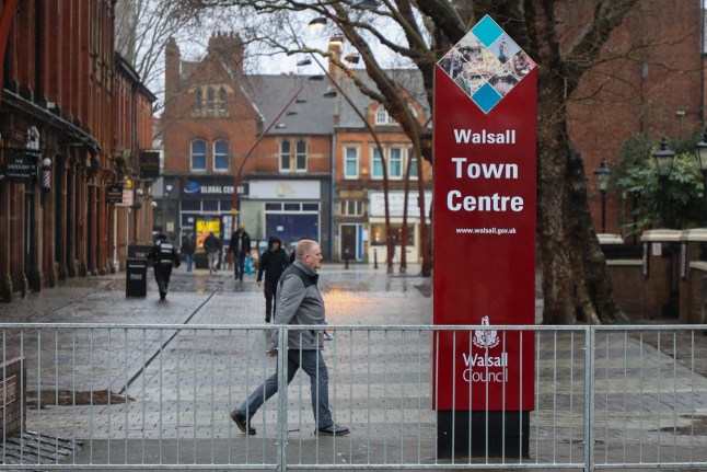 People in Walsall town centre, West Midlands. Walsall the worst place in Britain for quality of life in 2025 according to 2025 good Growth for Cities Index. // Residents of Britain's worst town for quality of life says its like living in "real-life episode of Shameless" where beggars earn more money than them by sitting outside a Wetherspoons. The Black Country town of Walsall, West Mids, was ranked the most deprived town in the UK in the 2025 Good Growth for Cities Index. It was once the centre of the UK's leather trade, with scores of shopping chains and independent shops, but has now descended into a "war-zone." Locals say they are too scared to walk the streets, which have become no-go zones after dark, due to "feral" youths, gang violence and drug addicts. Grim photos taken this week show how the town has descended into a "slum" - from dumped rubbish, boarded up houses and a surging homeless population. Photo released 19/01/2026