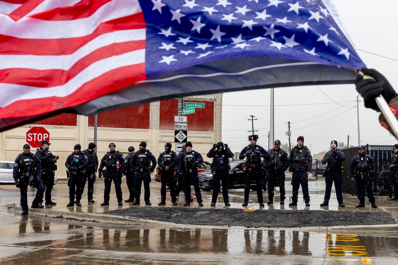 Hundreds protest President Donald Trump through streets of Detroit