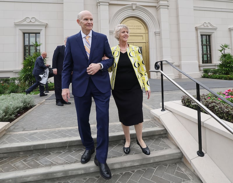 Elder Dale G. Renlund of the Quorum of the Twelve Apostles and his wife, Sister Ruth Renlund, walk by the San Pedro Sula Honduras Temple on Saturday, Oct. 12, 2024.