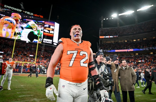 Garett Bolles (72) of the Denver Broncos takes in the moment after the Broncos' 33-30 overtime win over the Buffalo Bills at Empower Field at Mile High in Denver, Colorado on Saturday, January 17, 2026. (Photo by AAron Ontiveroz/The Denver Post)