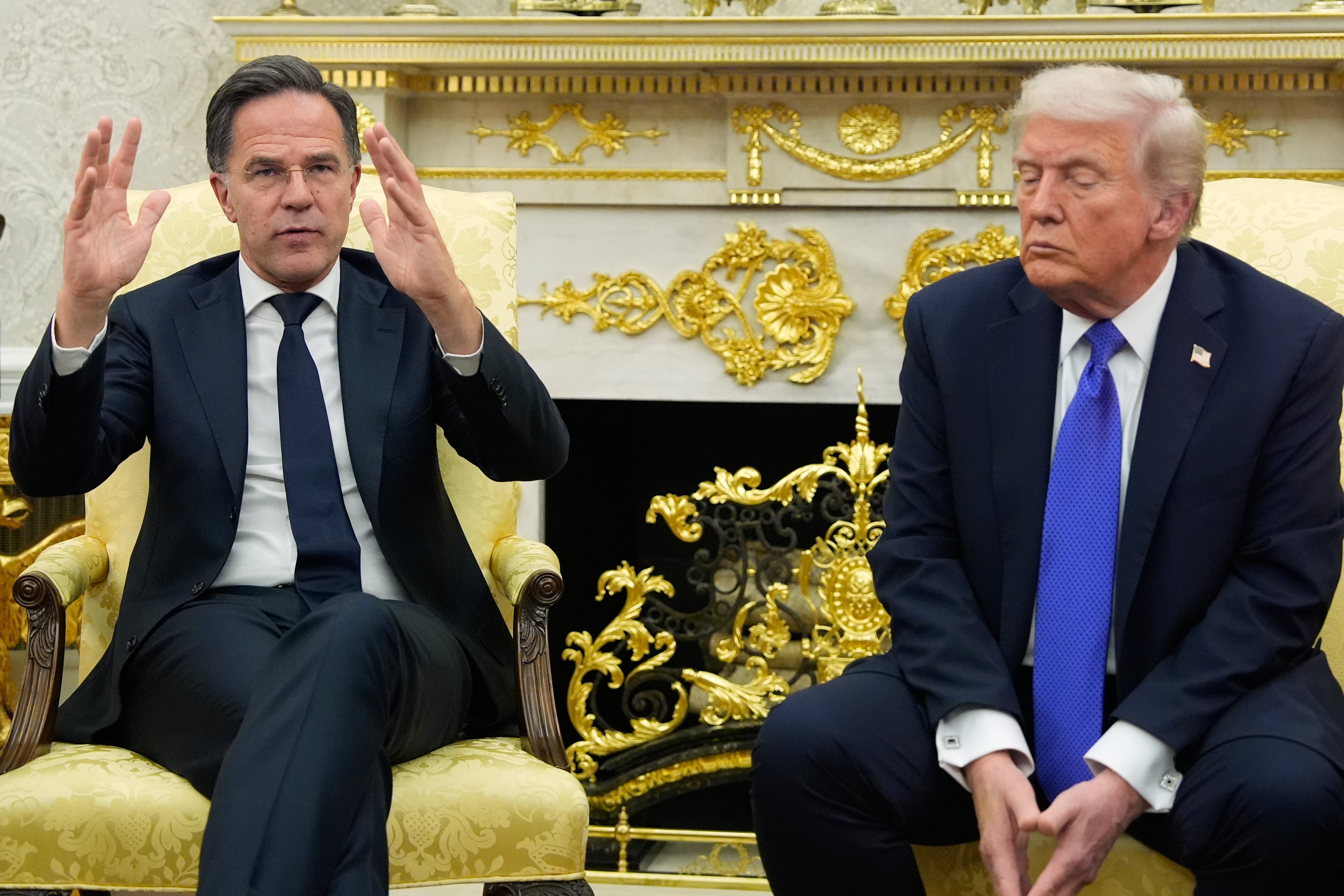 Mark Rutte (left) has been careful to shower Trump with praise