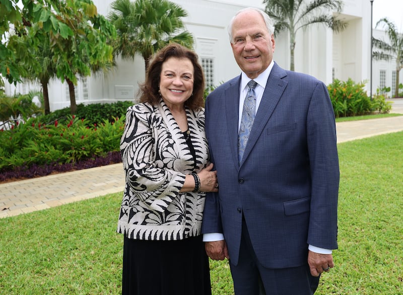 Elder Ronald A. Rasband, of The Church of Jesus Christ of Latter-day Saints’ Quorum of the Twelve Apostles, and his wife Sister Melanie Rasband stand near the Abidjan Ivory Coast Temple in Abidjan, Ivory Coast on Saturday, May 24, 2025.