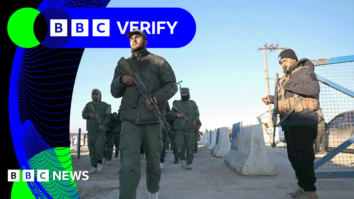 Verified video shows armed men taking control of IS camp in Syria - BBC