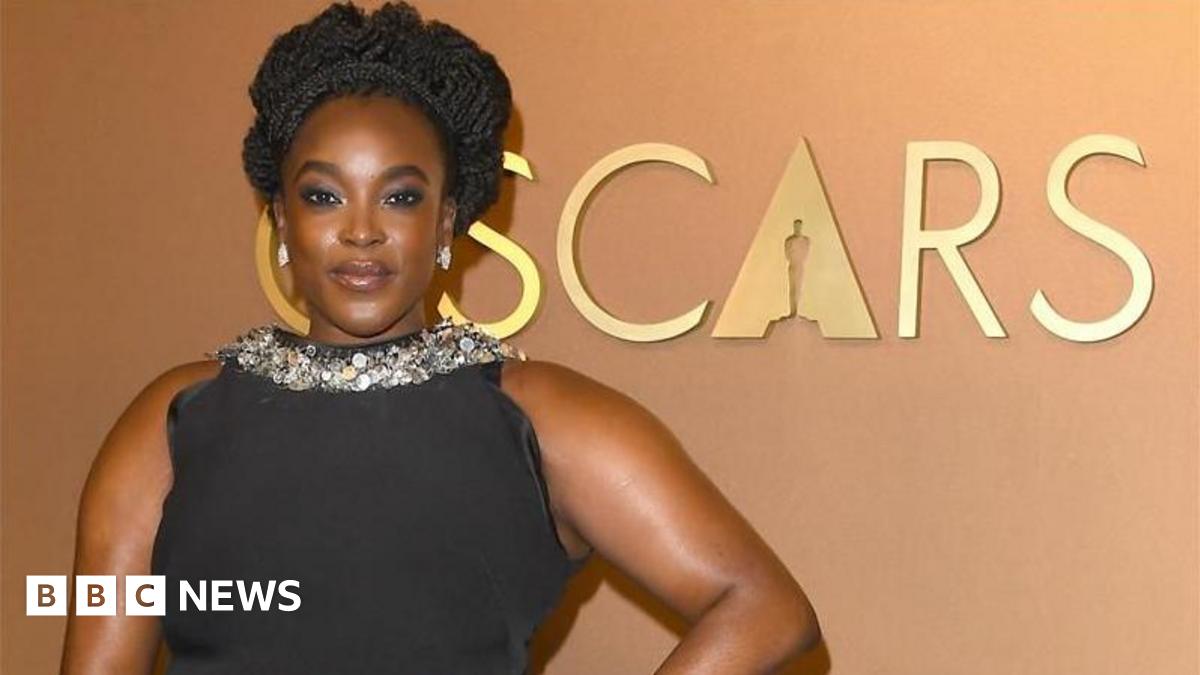 Wunmi Mosaku is pictured in a yellow dress and diamond earrings while attending the 83rd Golden Globes awards at The Beverly Hilton in Beverly Hills, Los Angeles.