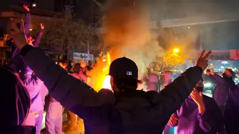 Getty Images  Fires are lit as protesters rally on January 8, 2026 in Tehran, Iran. 