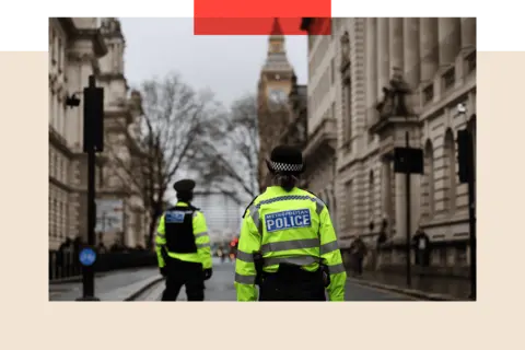Andy Rain/EPA - EFE/REX/Shutterstock Police officers stand guard in a street in London