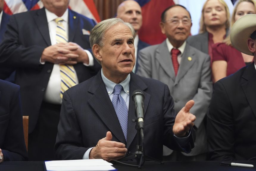 Texas Gov. Greg Abbott speaks to the media in the Senate Chamber at the Texas Capitol in Austin, Texas, on August 22, 2025.