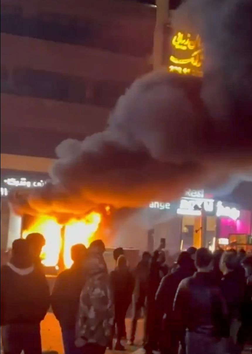 In this frame grab from video taken by an individual not employed by The Associated Press and obtained by the AP outside Iran shows a fire as people protest in Tehran, Iran, Friday, Jan. 9, 2026.