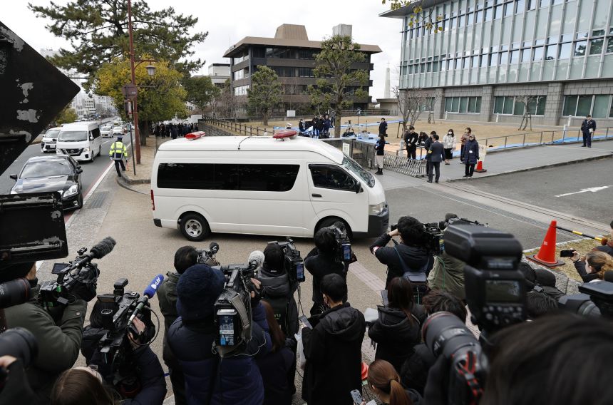A vehicle carrying Tetsuya Yamagami enters the Nara District Court for his sentencing hearing in Nara, western Japan, on January 21, 2026.