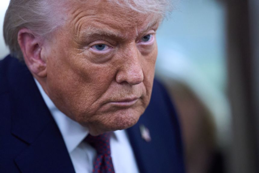President Donald Trump aboard Air Force One after leaving the World Economic Forum in Davos on January 22.
