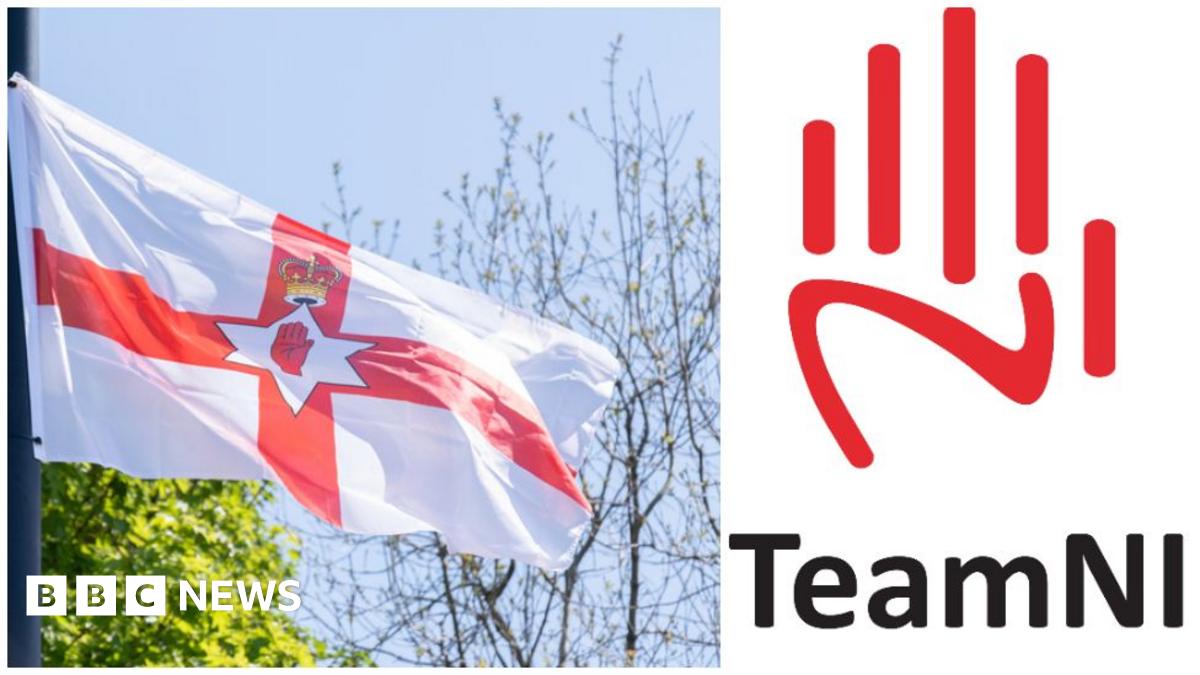 A collage of two images side by side - on the left is the Ulster Banner flag flying from a lampost. It is a white flag with a red cross. In the centre of a cross is a white star and in the centre of that is a red hand. Above the star with the hand is a crown. Trees can be seen behind the flag. On the right is the logo for Commonwealth Games Northern Ireland, which is a stylised red hand on top of of the words TeamNI