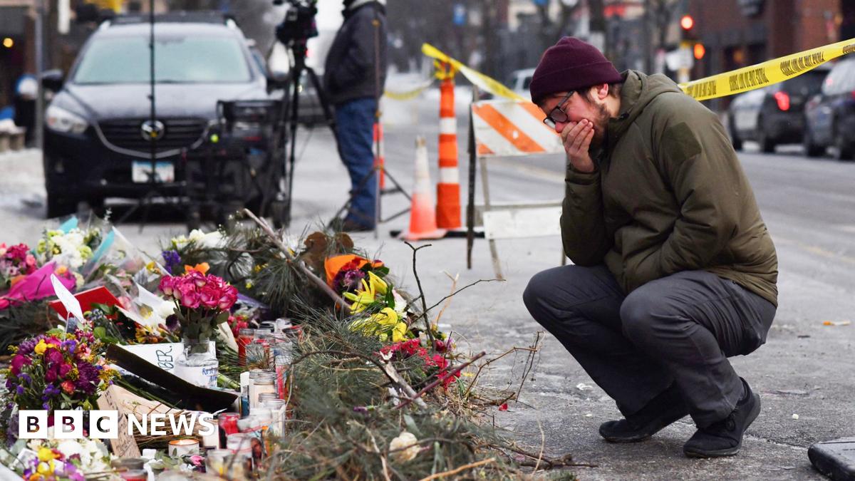 A local church provides hot coffee and hand warmers near a makeshift memorial for Alex Pretti in south Minneapolis, Minnesota
