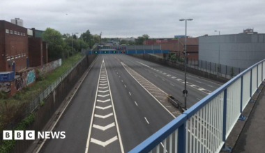 More than half a dozen lanes are pictured in this generic photo, taken from a bridge above the road.
